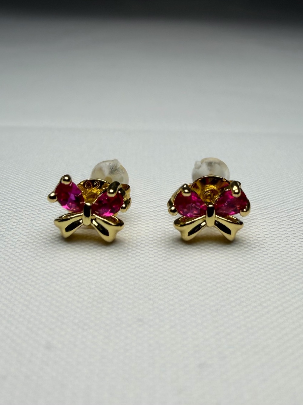 Natural Ruby Bow Tie Stud Earrings 0.20ctw Pear Cut Gold Over 925 Sterling 7mm